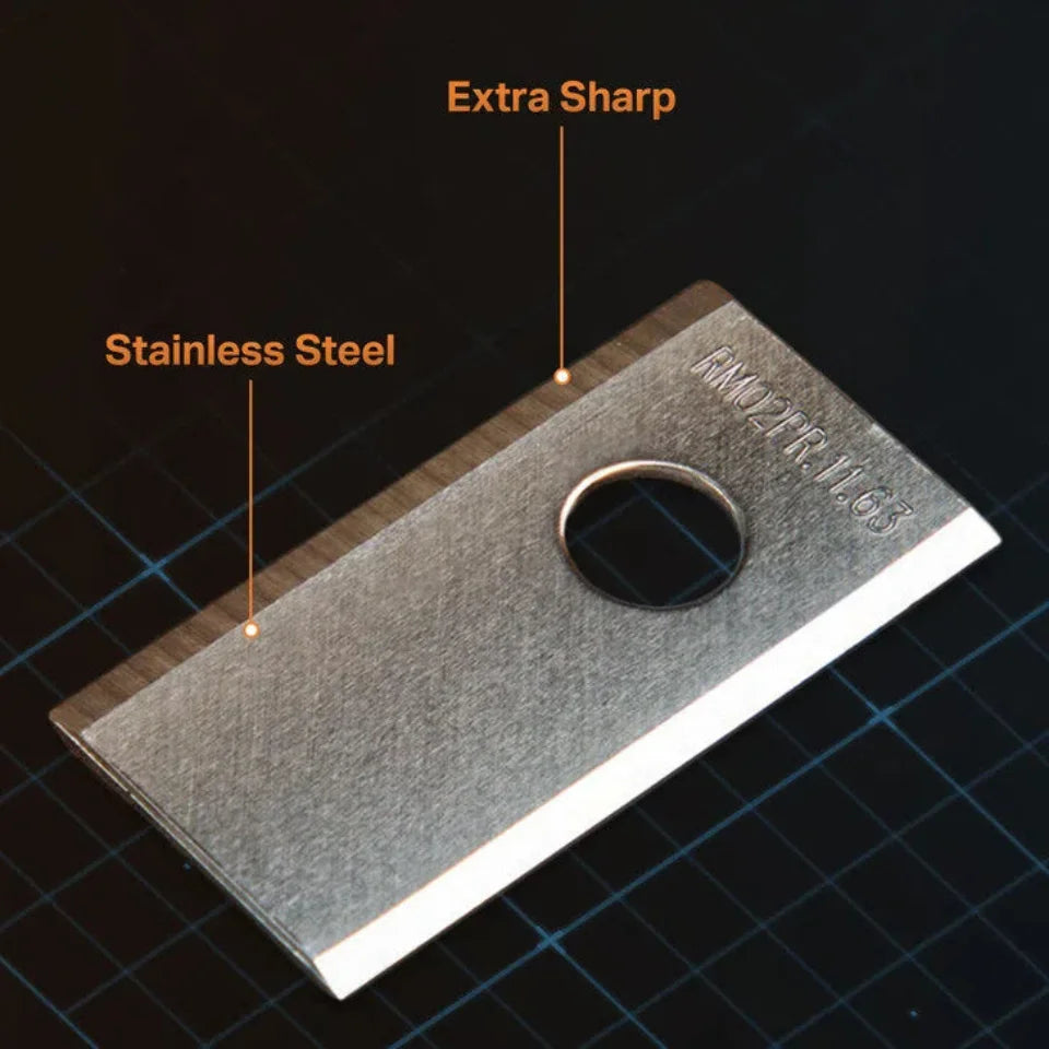 Metal blade with 'Extra Sharp' and 'Stainless Steel' labels on a grid background