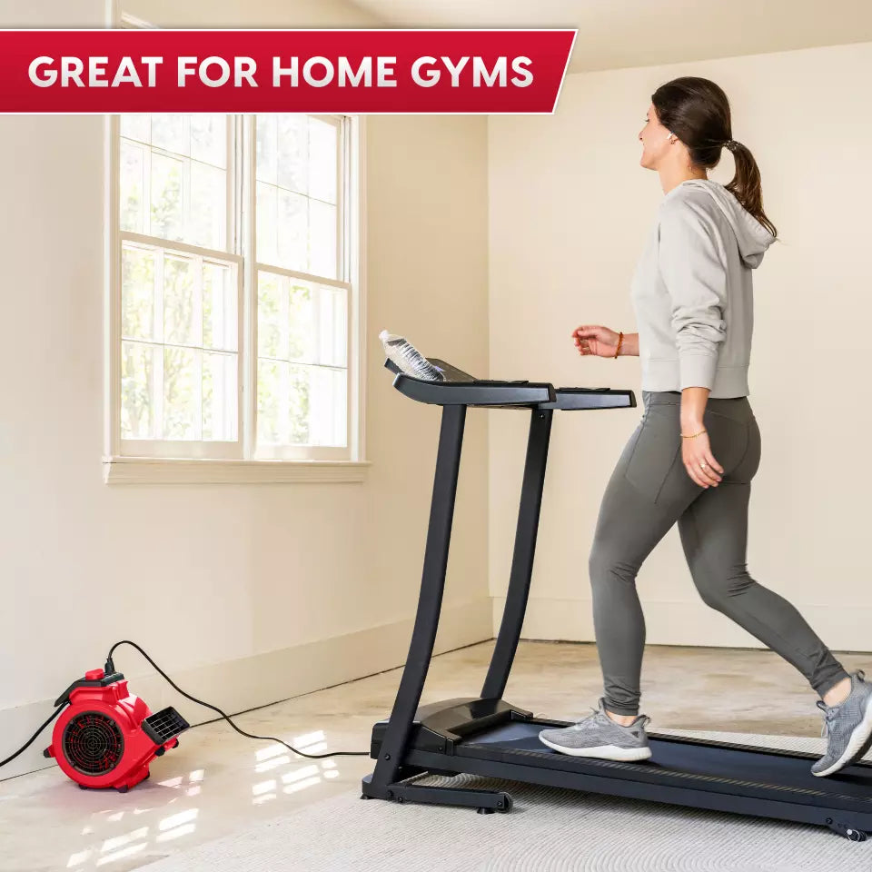 Woman using a treadmill in a home gym with text 'Great for Home Gyms'.