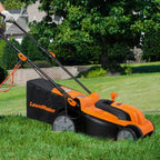 Orange and black LawnMaster lawn mower on a grassy lawn with trees and a house in the background.