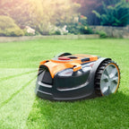 Robotic lawn mower on a green lawn with a blurred garden background