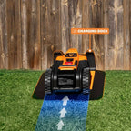 Robotic lawn mower on a charging dock with a wooden fence background