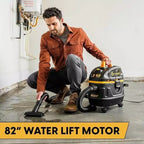Man using a Black & Decker vacuum cleaner in a garage with '82” Water Lift Motor' text.