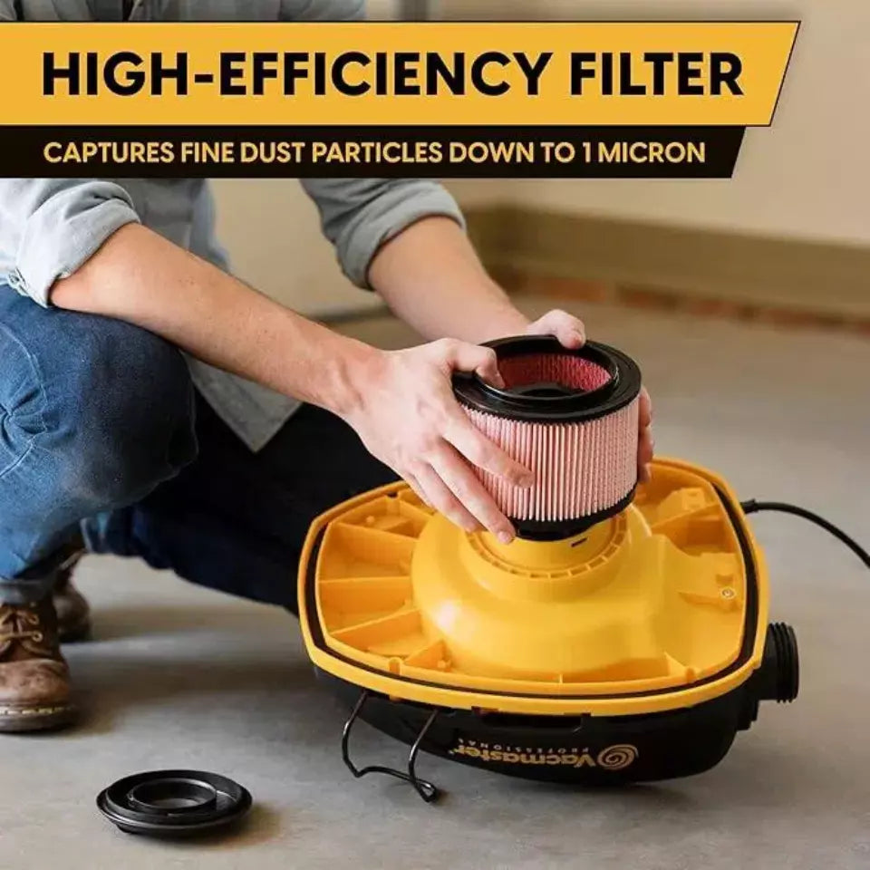 Person replacing a high-efficiency filter on a yellow vacuum cleaner.