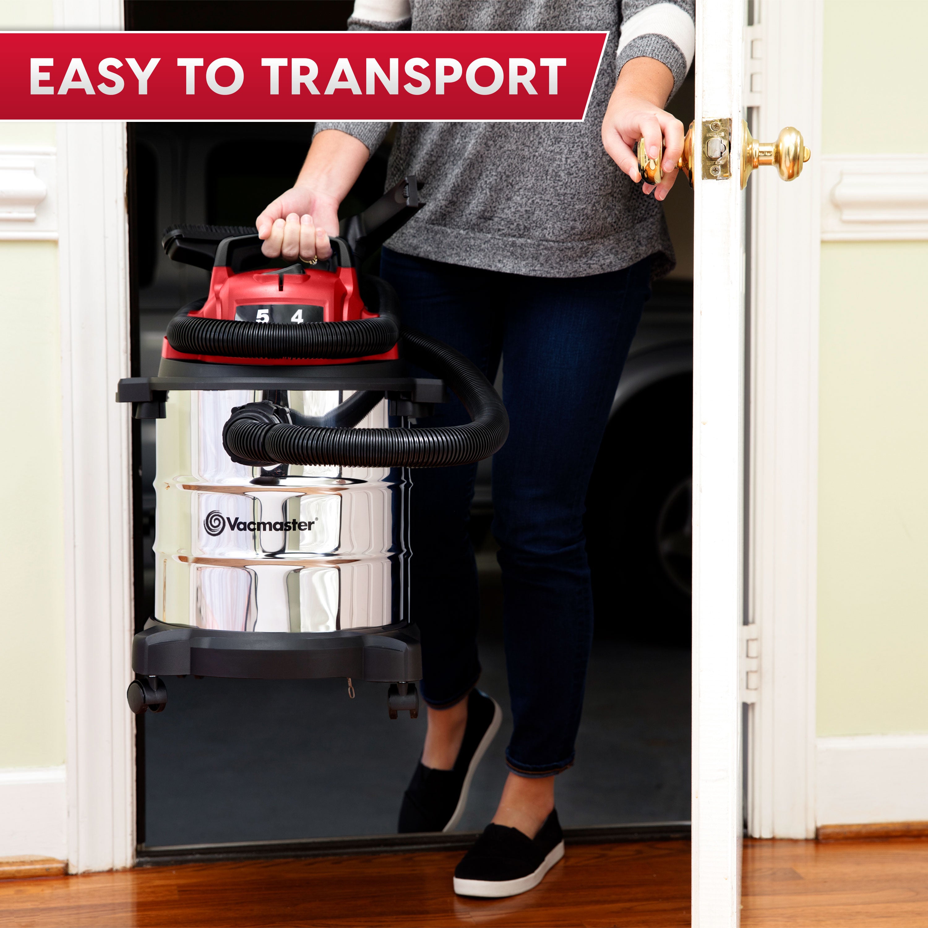 Person pushing a Vacmaster vacuum cleaner through a doorway with 'Easy to Transport' text above.